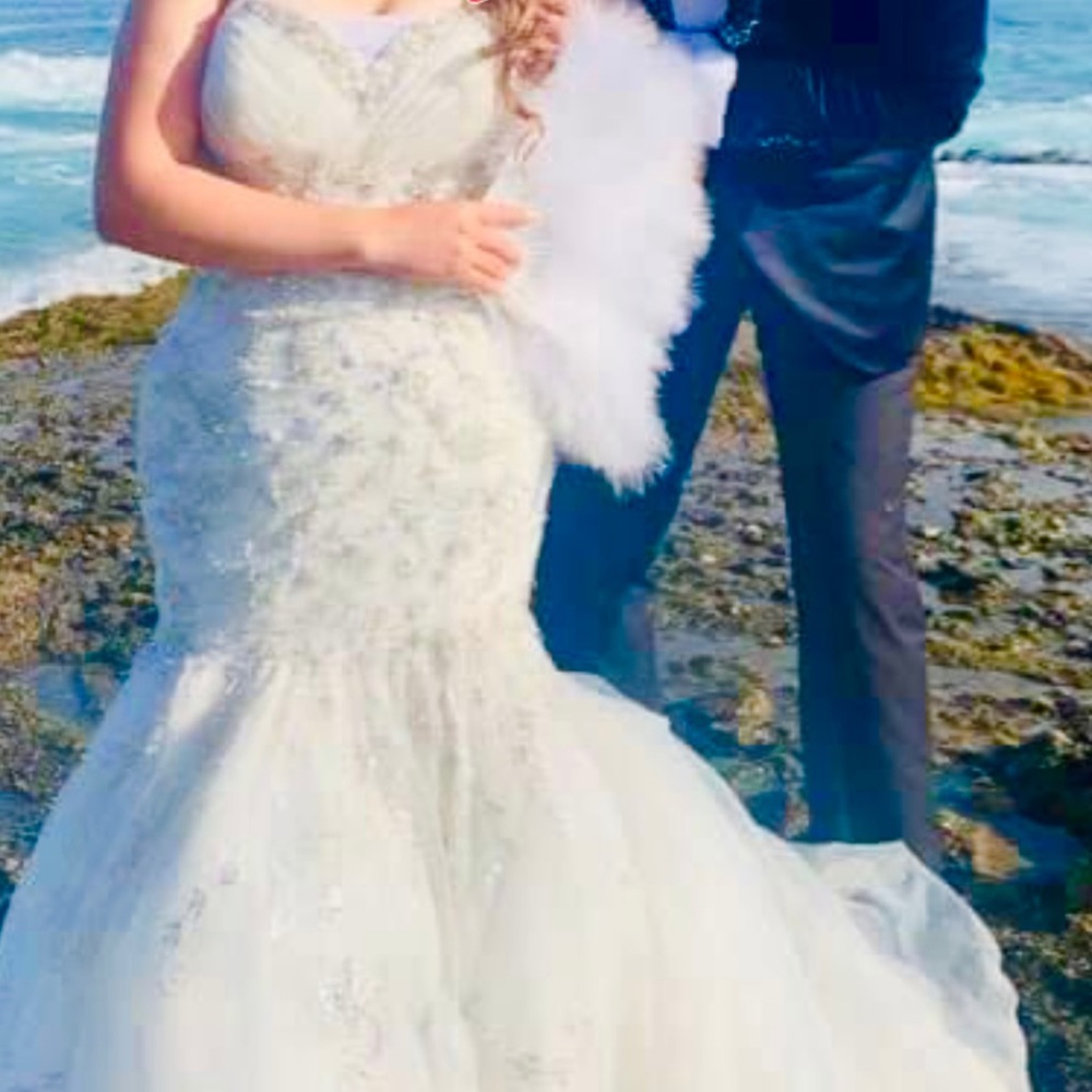 I only wore my wedding dress for three hours,